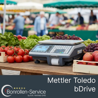 Mettler-Toledo bDrive Ladenwaage mit Waagenrollen auf Holztisch mit Obst.